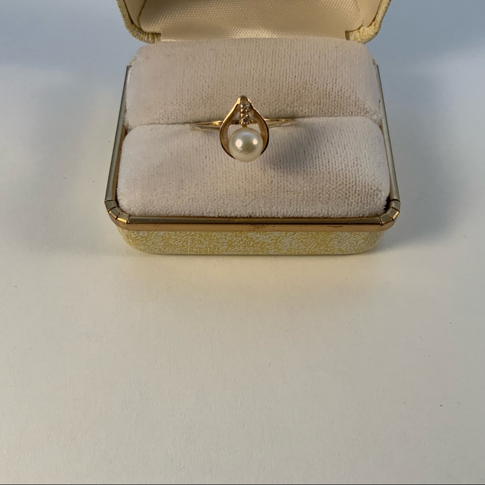 14k delicate pearl and diamond ring